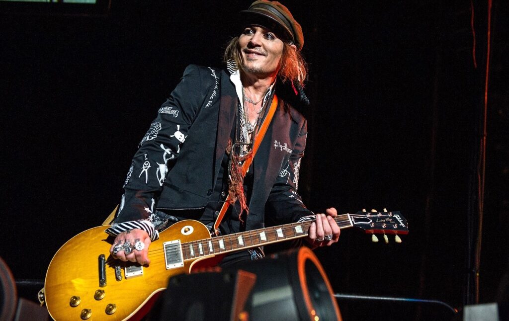 Johnny Depp jamming with a Gibson Les Paul live