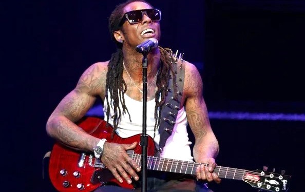 Lil Wayne playing a Gibson Les Paul Guitar live