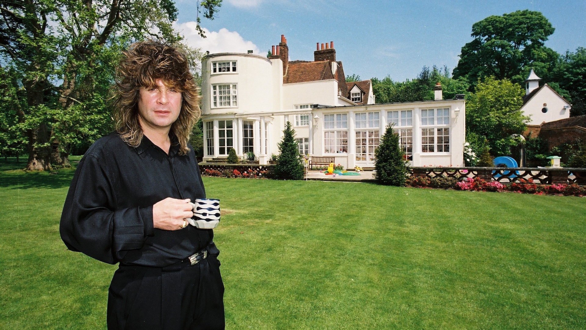 Ozzy Osbourne in the garden of his home, May 1988.